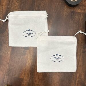 Prada Cream Drawstring Bag with Blue Logo set of 2